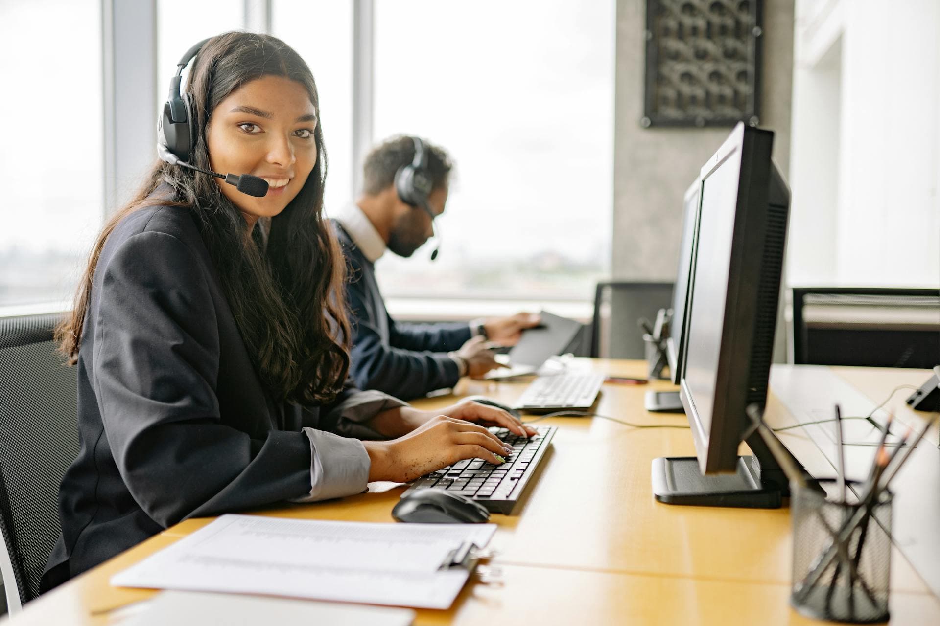 Customer care specialists coordinating support conversations
